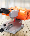 Mini Desktop 0 To 45 Degrees Multi Angle Portable Cutter for arts and crafts, orange unit on wooden surface.