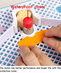 Close-up of waterproof cover and hands using Portable Stained Glass Grinder Kit For Glass And Ceramic Crafting 110V Mini Grinding Machine.