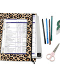 Zippered Leopard Print Coupon And Card Organizer for school supplies, clips into a 3 ring binder with pens and scissors shown