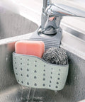 Double Deck Faucet Mount Kitchen Sink Organizer With Adjustable TPR Rubber Sponge Soap And Scrubber Storage Basket, grey storage with sponge and scrubber.