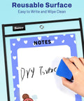Hand erasing text on oversized dry erase pocket with rings, reusable surface shown. Product focus: Oversized Dry Erase Pockets With Rings Pack of 30 for Reusable Worksheets, Clear Sheet Protectors and Black 10x14 Ticket Holders, Easy Insertion for 8.5x11 and 9x12 Papers, Classroom Favorite for Teachers.