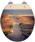 Fresh Coastal Thatched Roof Umbrella Decorative Resin Toilet Seat With Smooth Drop Action and Quick Release Hinges showing a beach path image.