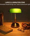 Green Glass Bankers Desk Lamp With Brass Base on wooden desk with books, retro vibe lighting, pull chain switch