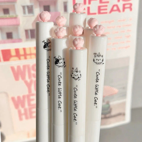 Dope Cute Twistable Cat Paw Pens Set 0.5mm Black Gel Ink Smooth Writing Kawaii Cartoon Kitten Pens with pink paw tops in a group