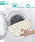 Person holding Six Pack Steam Mop Pads Replacement For PowerFresh Steam Mop 1940 Series, preparing for washing