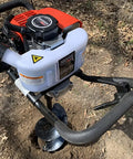 Top view of Forty Three CC Gas Earth Auger Powerhead With 8 Inch Auger Bit for post holes, showing low vibration handles and durable body.