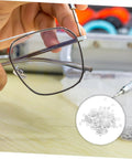 Rimless Eyeglasses Repair Washers Kit With 200 Pieces Of Metal Flat Gaskets For Quick Frame Tightening, tool shown in use.