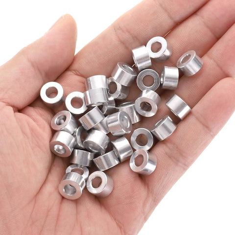 Aluminum Spacer 5mm Bore 10mm OD 6mm Length Standoff For M5 Screws Bolts And Rods, 30 Piece Pack, held in hand