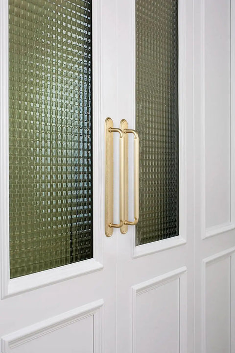 2 Pack Champagne Bronze Cabinet Pulls With Backplates, 7 1/2 Inch Center-to-Center Drawer Handles on white paneled doors