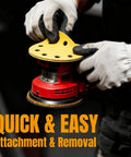 Gloved hands attaching 5 inch 8 hole sanding disc to random orbital sander, part of Dustless Sanding Discs Set 50 Pcs