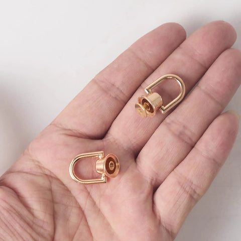 4 Pcs Dope Gold D Rings For Purses Rotatable 360 Degree Metal Hardware With Studs Screw Ball Head Buttons And Rivets, held in a hand