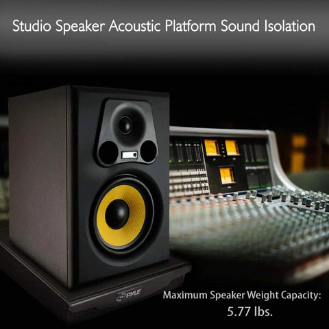 Speaker Isolation Pads For Studio Monitors Subwoofers And Loudspeakers showing foam riser with rubber base near audio mixer.