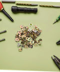 50 Pack Of Straight Up Solid Iron Captive Nut Fasteners With Top Shelf License Plate Screw Retainer Clips on a green background.