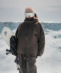 Person in Baggy Fit Ski Jacket For Men And Women Insulated Waterproof Windproof Snow Coat Loose Snowboarding Jacket For All Day Comfort