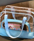 Transparent bag with blue straps, showing Dry Wet Separated Storage Bag For Gym And Beach Gear With Separate Dry And Wet Compartments.