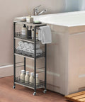 Four Tier Narrow Storage Cart On Wheels With Wood Tabletop, Slide Out Shelves, beside bathtub with toiletries and towels
