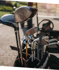 Golf club bag with visible Rugged Rubber T Handle Hasp Draw Latch for Toolboxes, set against outdoor background.