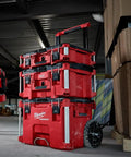 Packout 22 Inch Tool Box With Heavy Duty Latches And Interior Organizer Trays Durable Modular Storage System For Tools Black And Red Versatile Portable Chest For Home Garage And Job Site, stacked red tool boxes with wheels in workshop.