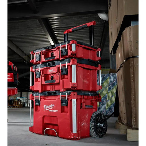 Packout 22 Inch Tool Box With Heavy Duty Latches And Interior Organizer Trays Durable Modular Storage System For Tools Black And Red Versatile Portable Chest For Home Garage And Job Site, stacked red tool boxes with wheels in workshop.