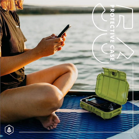Person using phone with open EDC 56 Dry Box Go-To Tough Protective Case Made in USA for Organizing Cameras, Phones, Gear nearby
