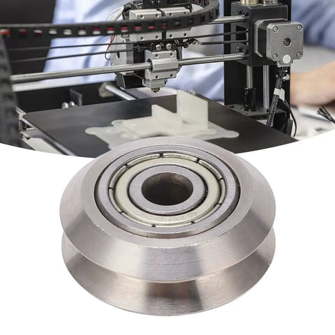 Top Shelf 13 Piece V Groove Guide Pulley Kit Featuring Heavy Duty Stainless Steel Bearings for 3D Printers with a close-up view of a pulley.