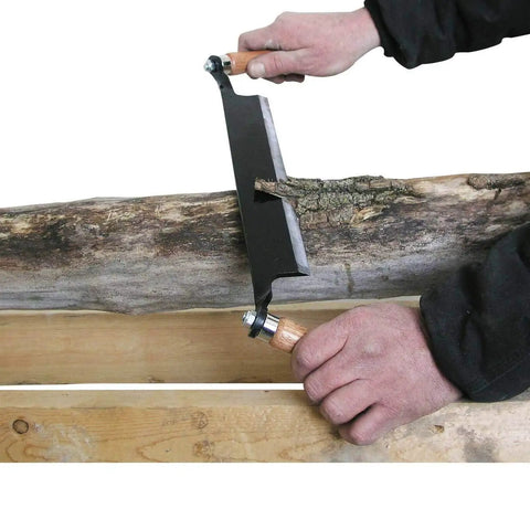 Rugged Straight Draw Shave Tool Featuring A Beefed Up 10 Inch High Carbon Steel Blade Perfect For Log Peeling Firewood Skinning And Precision Wood Shaping That Knocks Out Heavy Duty Jobs Every Time in use on a log.