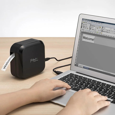 P-Touch CUBE Plus Bluetooth Label Maker PT-P710BT printing 'Welcome' label connected to laptop