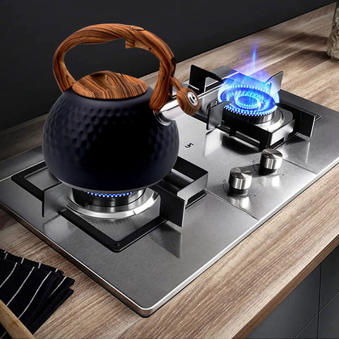 Loud Stovetop Tea Kettle With Whistle For Boiling Water Coffee Or Milk 3.1 Quart Heavy Stainless Steel Black With Wood Pattern Handle And Diamond Design Easy Button Release Spout on stove