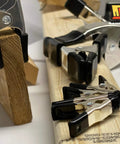 Nickel Plated Metal Spring Clamps Set for Woodworking and Photography Backdrops, 2, 4, 6 Inch Sizes on wooden board