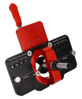 Front view of 35mm Hinge Jig With Concealed Positioning, Adjustable Pressure Plate And Quick Fix Clips, red and black tool.