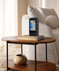 Rugged Soft Shell Case For ELEMNT ROAM V3 GPS Cycling Computer on a wooden table, silicone leather blend, black finish.