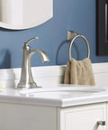 Modern bathroom sink with Ridgeport Single Control Lav Faucet With Brushed Nickel Finish, slick contemporary style over white vanity.