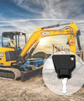 10 Pack Ignition Starter Keys For Heavy Equipment Pros close-up with yellow excavator in background