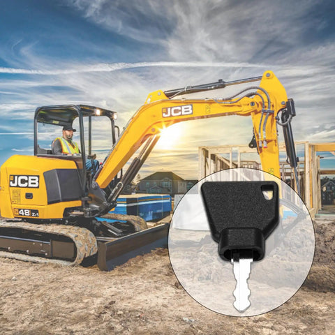 10 Pack Ignition Starter Keys For Heavy Equipment Pros close-up with yellow excavator in background