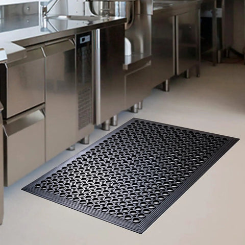 Anti Fatigue Rubber Floor Mat For Restaurant And Kitchen Durable Drainage Outdoor Doormat No Slip For Bars And Commercial Use Black 36 By 60 Inches Heavy Duty Workhorse Non Slip Entrance Mat For High Traffic Areas in kitchen setting.
