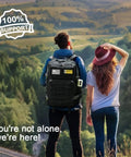 Man wearing Tactical Backpack For Work And Outdoors, 40L Heavy Duty Rucksack with MOLLE in a scenic hiking area with woman
