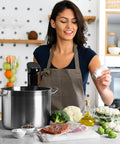 Woman using sous vide with vacuum-sealed ingredients, featuring Six Times Fresher Meals With 200 Count 8x12 Inch Vacuum Sealer Bags For Food Storage BPA Free Precut Quart Bags Puncture Resistant And Great For Meal Prep Sous Vide Freezer And Everyday Kitchen Organization.