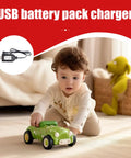 Child playing with green toy car, RC Battery Chargers USB 4.8V RC Car Charger With Indicator Light For Remote Control Toys shown