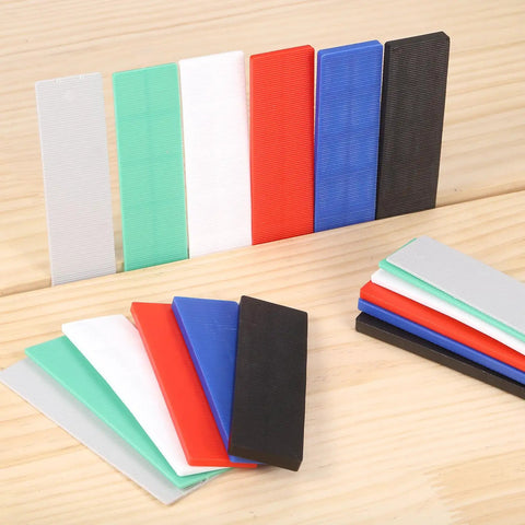 Built Tough 120 Pack Black Plastic Tile Shims 15 64 Inch Thick Structural Spacers For Leveling Floors And Walls in various colors.