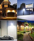 Built Tough Solar Led Flood Light With Wireless Dimmable Remote And Ip66 Waterproof Housing illuminating a driveway and homes at night.