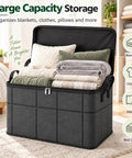 Heavy Duty Foldable Storage Bins With Tight Lids Super Spacious For Winter Throws And Pillows, filled with blankets and pillows.