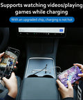 Tesla Model Y Center Console USB Hub Charger With 3 Fast Charging Ports, shows phones charging while playing games at center console.