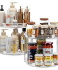 Smooth Spinning Two Tier Lazy Susan Turntable Organizer for Kitchen Pantry Fridge and Bathroom Vanity Spice Rack Storage with various jars and bottles.