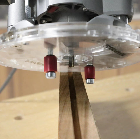 Universal 7 Inch Router Base Plate With Adjustable Swivel Wings And Clear Top For Sharp Vision showing precision bit over wood.