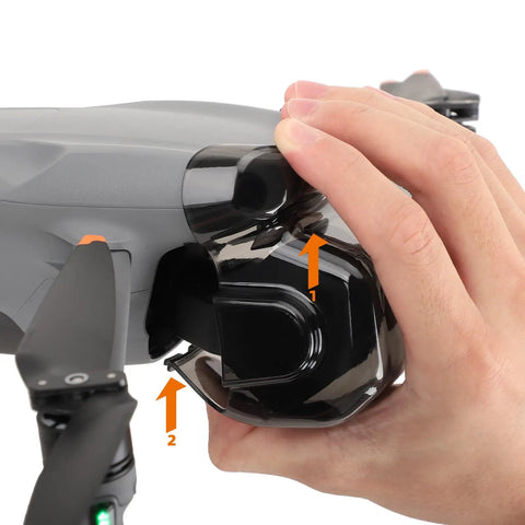 Person attaching Anti Scratch Gimbal Lens Cap For Air 3S Drone Protective Cover Durable PC Material Easy Snap On to drone
