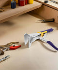 Hand Seamer Straight Jaw Sheet Metal Bender Tool with textured locking pliers on workbench for HVAC ductwork and metal bending