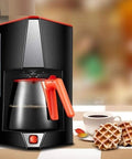 Top Shelf Automatic Espresso Maker Crushing Your Morning Grind While Pouring Killer Lattes Or Chilled Cold Brew Sips Around The House With Easy Drip Coffee And Tea Capabilities with black and red design near coffee and waffles.