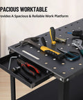 Heavy Duty Steel Welding Table Rock Solid Workbench Delivering Knockout Stability And A Massive 1200 Pound Weight Limit 36 X 19 Inch Surface with tools organized on the surface.