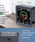 Keeps Tabs On Your Indoor Air Quality With A Six In One Monitor CO2 PM25 PM10 AQI Temperature And Humidity on a desk with dimensions