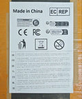 Label showing warning, CE, FCC marks, and recycling info on cardboard, made in China notice.